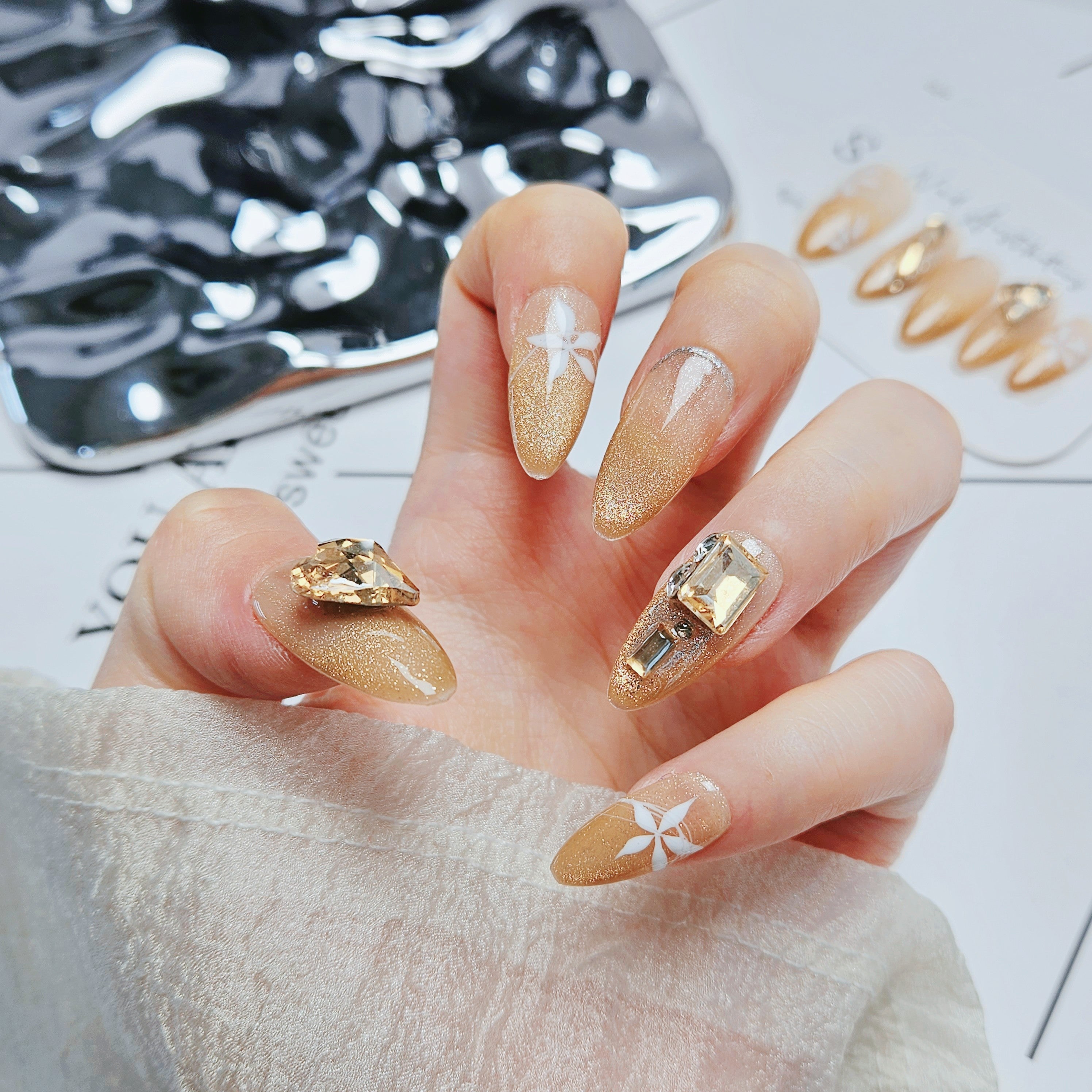Glowing Almond Nails with Sparkle